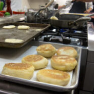 English Muffins before, during and after frying.