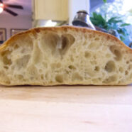 Overhandled loaf – didn’t rise as much, odd shaped holes, but largish holes along the bottom