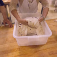 Folding the olive loaf dough