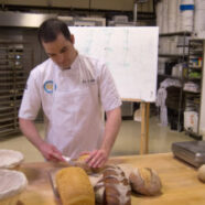 Frank slicing bread for our tasting
