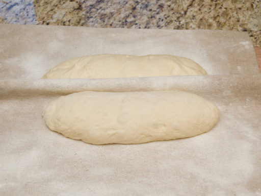 Shaped into batards and moved onto floured couche.
